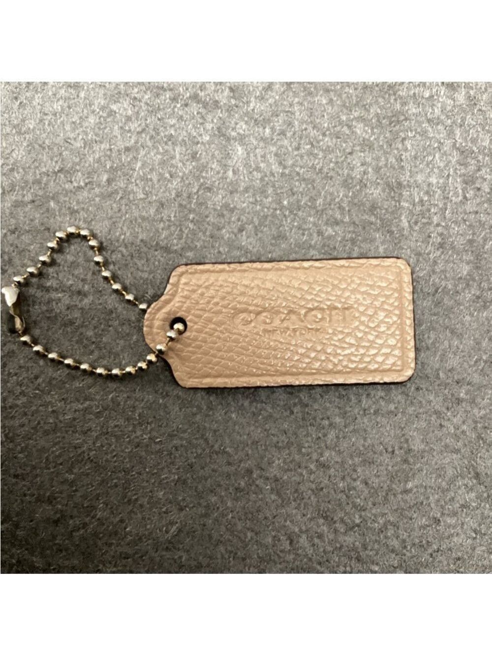 Coach Beige Leather Key Holder or Purse Charm 2”. 3014